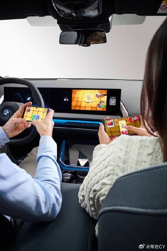 BMW 宣佈即將在車上提供 UNO 遊戲，最多四個乘客可以把自己的手機通過 AirConsole 平台連接在車機上一起打牌[二哈]配圖