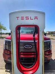 Automakers adding the Tesla North American Charging Standard配图